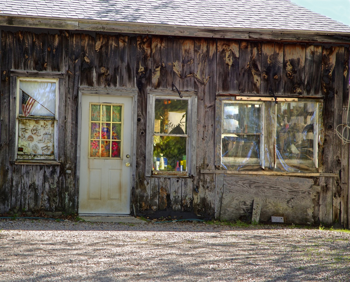 What interested me in this picture was that at first, I couldn't see what was behind these windows.  At first it looked like an old farm house, called Lazy Acres.  When I went further with the process, many things were revealed behind the windows.